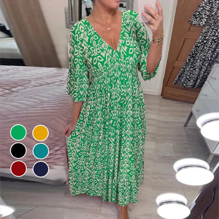 Vestido estampado com decote em V e mangas largas.